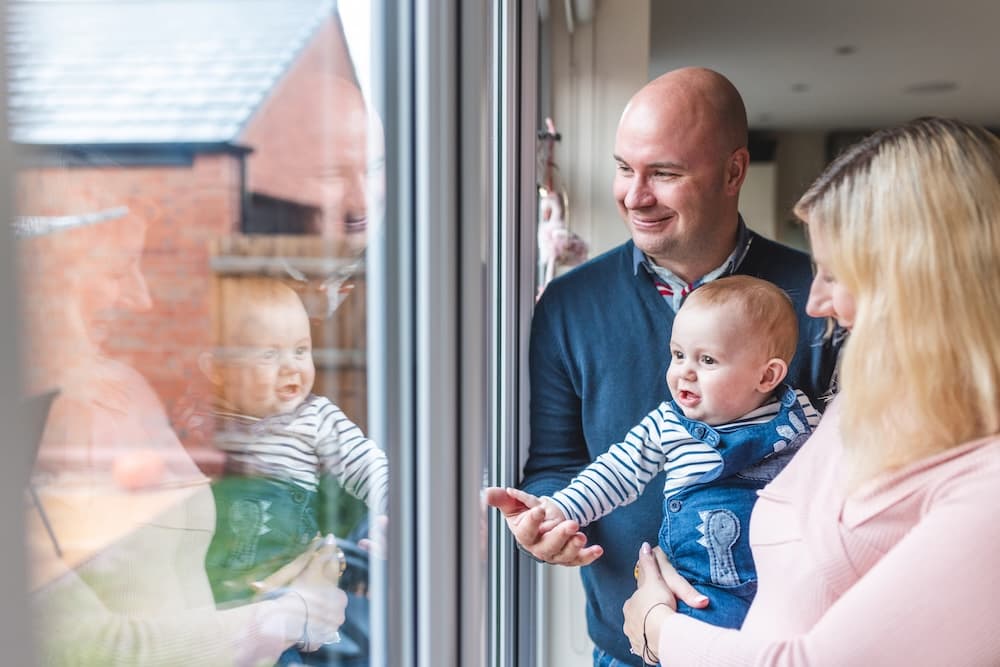 Happy family enjoying control of their property after successful enfranchisement